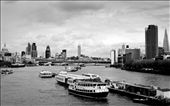 Great skyline of the London city with river boats and barges running along or parked there.: by jvipele, Views[221]