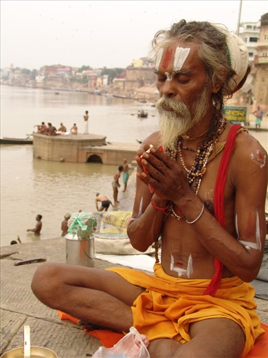 It may be fanciful, but I feel that I have somehow shared in this religious experience - that the act of carefully focusing my lens on the minute details of the sadhu's actions gave me insight that mere observation could not.