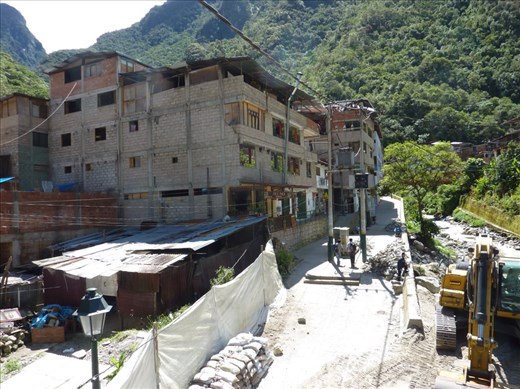 The river was silting up so they use this digger every day.  The sand that is removed is used for sandbags 'just in case'.