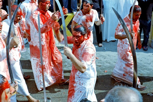 The 10th day of Muharram is a showcase of Shia Muslim's mourning of the death of their martyr Imam Husayn. They chant Haider! as they parade with sword and with blood flowing profusely from voluntarily wounding themselves. The sight is not for the faint of heart.