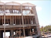 On the manufactured island of Ambergris Caye, old techniques achieve modern results. In building the new condos to attract Ex-Pats and Tourists, Belizean masons use saplings to support the upper floors during construction. All sand for the concrete must be brought by boat, and sifted on site for the correct aggregate size for the project.: by kaitala, Views[596]