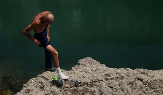 Nebojša had spent the last month fishing in this river without even seeing a single fish and his friends all told me that no more fish lived in the river. When I brought this up to Nebojša he simply laughed, saying 