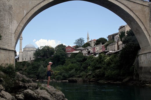 All through the summer men  like Nebojša spend their time as close to the river as possible, often jumping off the infamous Mostar bridge, once a coming of age rite for young men, now a tourist attraction