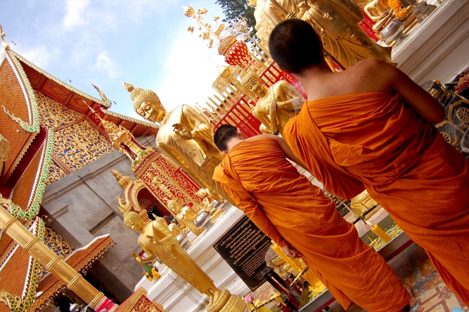 After a winding drive and a climb up the Stairway to Heaven your arrival at the gates of the Golden Temple in Chiang Mai, Thailand is nothing short of breath taking. The vibrant colors and rich spiritual energy flow throughout the temple as the gold accents on its walls shimmer in the sunlight. This moment was captured during a prayer ritual of the local monks whose solitude only added to the tranquility in the air.