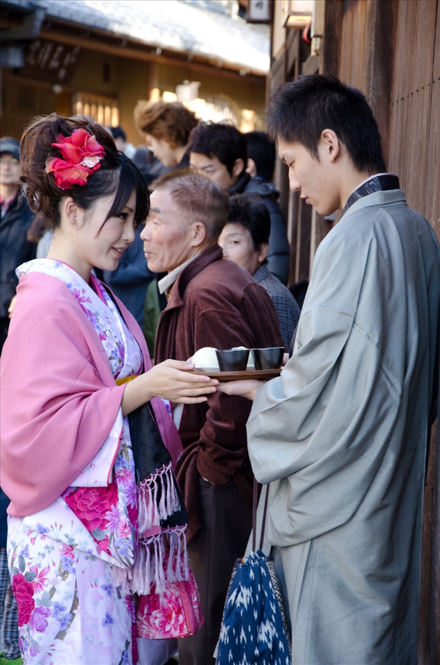 Lovers in Kiyomizu-dera where is the most famous spot during maple leaves season. Many tourists wear kimono to visit this place.