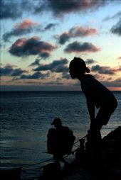 A day's end: a girl calls to her father as he loads his boat.: by karadlr, Views[327]