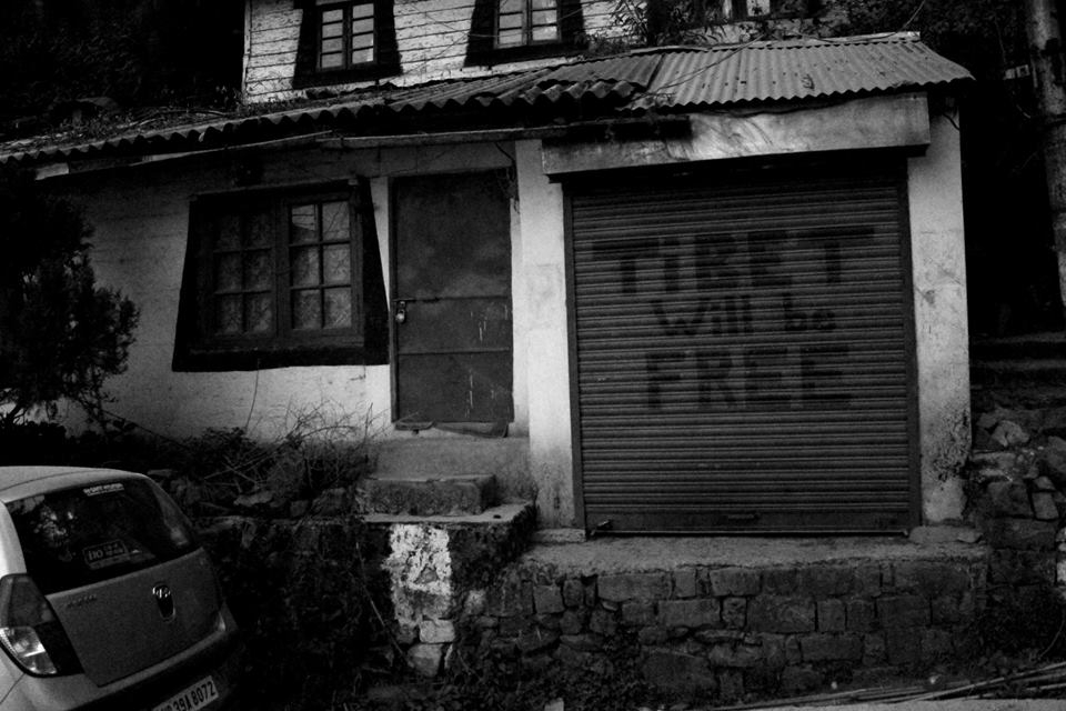 It was in 1959 when HH Dalai Lama initiated his quest to free Tibet from the clutches of Chinese government. This led to the migration of many Buddhists to India. The Indian government provided them with Dharamshala as a place to settle and flourish. On coming back from Gyoto monastery, I decided to take a late walk to Dharamkot, another small section of the Dharamshala province. This shot was taken en-route to Dharamkot which is about 14 km from Dharamshala. The route from McLeod upwards gets a bit scary as there are very less homes and shops with all the tall tress blanketing the road with very little light creeping in. The sentiments of the message on the shutter of the shop says it all, the Tibetans although have settled and made a living here, haven't forgotten the cause that they had left for.