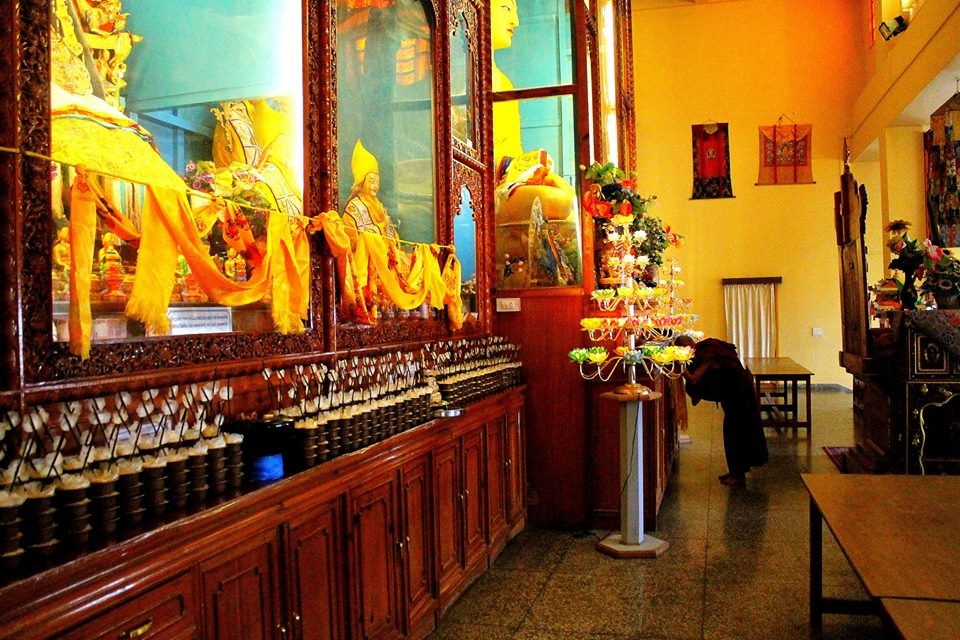 My next destination were something one can't miss when in Dharamshala, the Tibetan monasteries. This was my 2nd day of the journey. The Buddhist religion is known for their simple living and peaceful nature which in turn has made many people around the world follow it. The monasteries are an art in itself, the vibrancy and the peace one can experience here is divine. I took this shot at the Gyoto monastery, one of the lesser visited monastery situated about 10 km from the main town of Dharamshala. I reached here about 1 hour prior to the afternoon prayers and got real good time to shoot the beauty of the monastery. Just before the main prayer, one of the monks came in to offer his prayers. The timing got precise for me and this one turned out to be one of the best shot of my trip.