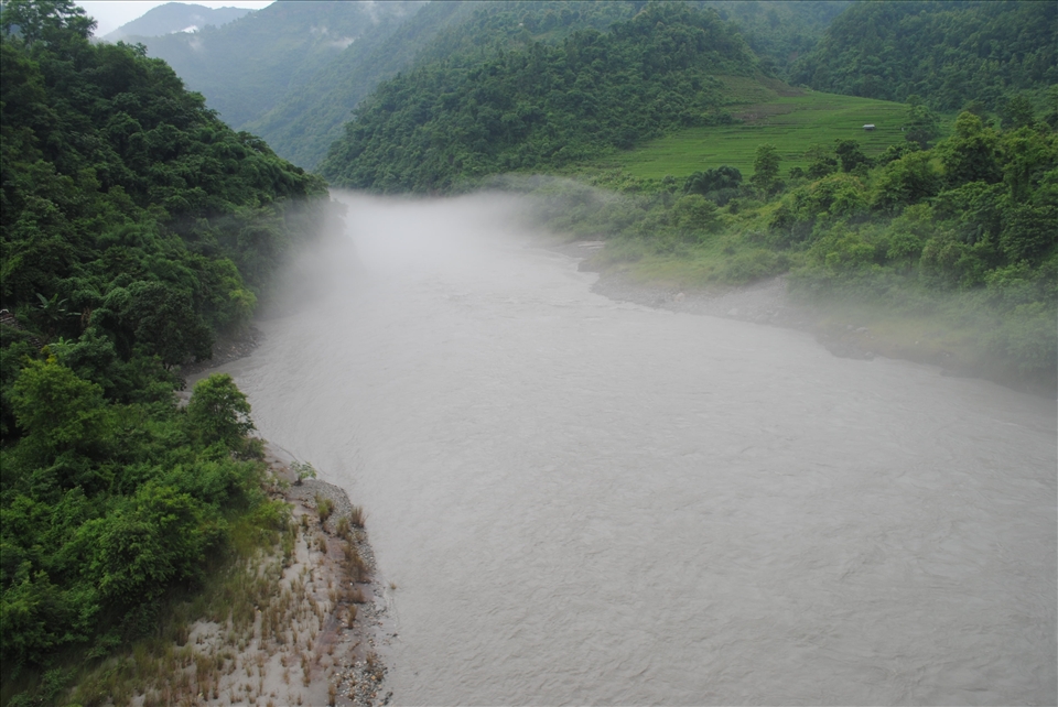Bliss at Trisuli:

It is green forest area in Nepal on the way to Pokhra from Kathmandu. Trisula flowing at a fast speed roaring at the banks after the first showers of the Monsoons.Looks like the clouds came down the valley and river just to taste its own raindrops. River of clouds overshadowed the flowing beauty beneath.

Beyond from this point the cable car takes you up 1208 metre high to the pilgrim of Manokamna Mandir. the clouds gave a welcome to us as a way to the pious shrine and new world above us.
