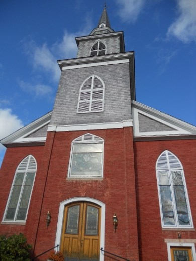 One of many, many New England churches, plus sunlight.