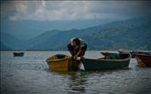 Phewa Lake is the second largest lake of Nepal and also one of the most beautiful and majestic lakes of the country. It is a prime attraction for photographers, boaters and shore side strollers. Boats are a common form of transportation used by the locals, a source of living for fishermen and a wonderful way for the tourists to enjoy the adventure on water. Fishermen are seen paddling their boats close to the lake’s edge; it’s a unique job!: by karimsakr, Views[1025]