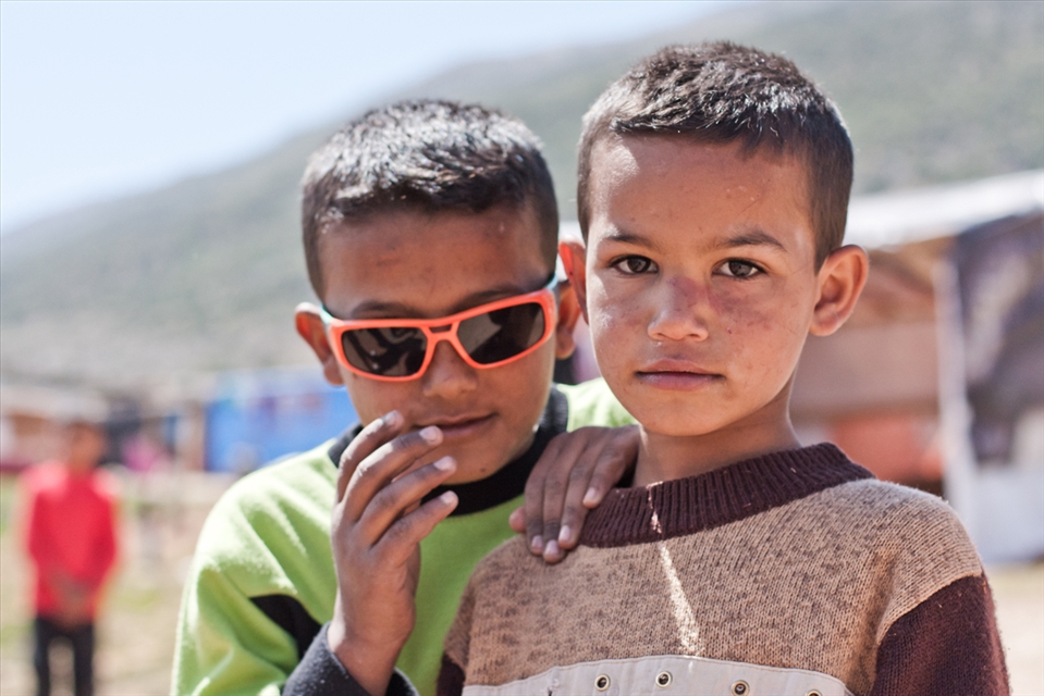 Two friends, newly met in the refugee camp, happy and have nothing to worry about in Lebanon. People are dying on the other side of the border, but not here. The best thing about being a refugee is that it’s somehow safe, at least safer than Syria where the civil war has not stopped for more than 2 years now…  It’s sad to know that these children did not go to school since the beginning of the war; but the situation is so dire for such refugees that it’s easy to overlook the importance of education… 