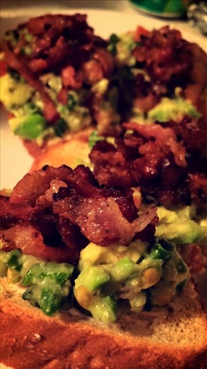 Garlic infused bacon + homemade guac + mango-jalapeno jam + honey oat toast