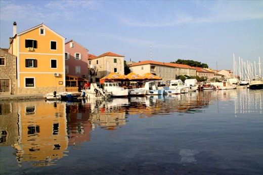 Imperfect Harmony. Cities and towns are built around the water. During the summer many festivals are located along the harbours and seaside, illustrating the importance of water for their cultural lifestyle. - Sali, Croatia