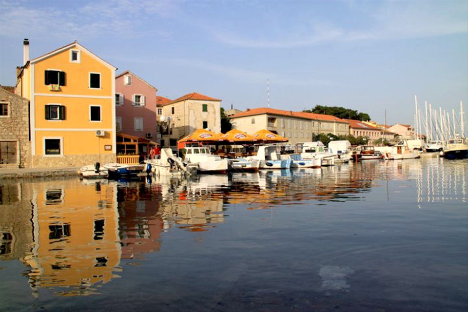 Imperfect Harmony. Cities and towns are built around the water. During the summer many festivals are located along the harbours and seaside, illustrating the importance of water for their cultural lifestyle. - Sali, Croatia