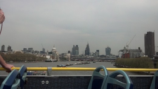 Queen Victoria's bridge and London City in the background.