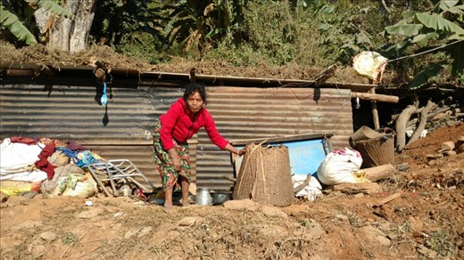 This is the home owner in front of the structure she's lived in for the past 2years. Soon she will have a safe, secure new home 😊