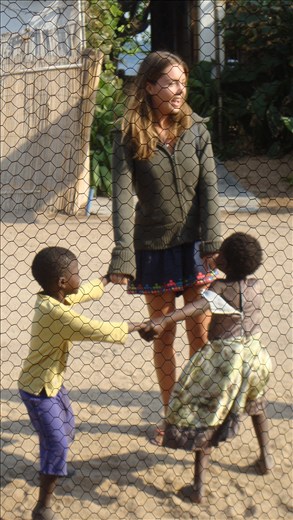 Singing songs and playing games. Cape Maclear, Lake Malawi