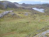 A loch on the top of Eigg. Legend has it that a female warrior tribe was enticed out to the island in the middle of the loch and then drowned as payback for killing a saint (name forgotten!): by katescarlett, Views[270]
