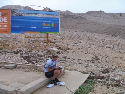 Kate, alone and destitute while stuck in a barren wasteland waiting for a ferry