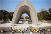 The Memorial Cenotaph is situated near the centre of the Peace Park; and holds all the names of those killed. The monument is designed to align with the Peace Flame and the A Bomb Dome as illustrated in my photograph. It was one of the first to be build in what was once an open field and opened in 1952. The arch shape used represents a shelter for the souls of the victims. : by kathrynskreations, Views[626]