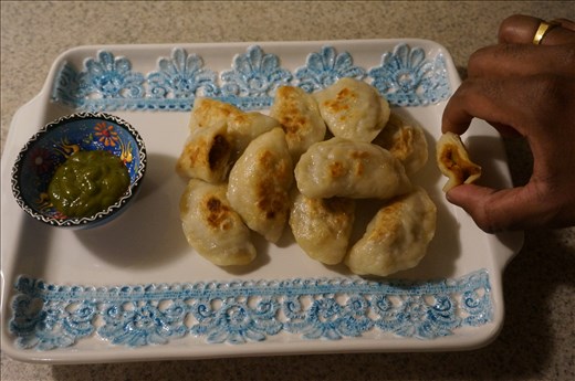 Fried pyrohies with cilantro chutney, so hard to resist