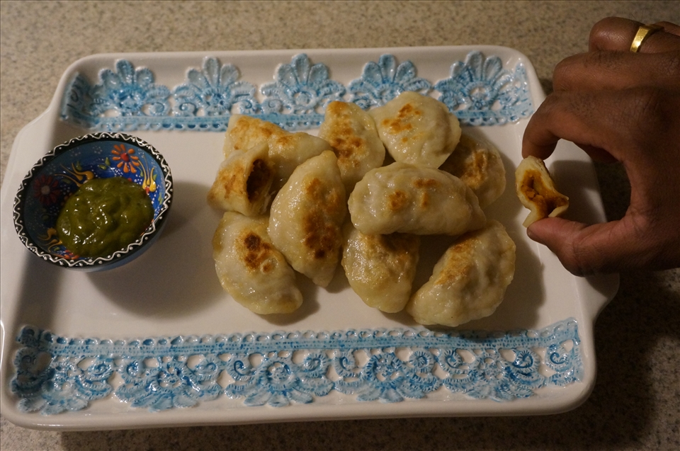 Fried pyrohies with cilantro chutney, so hard to resist