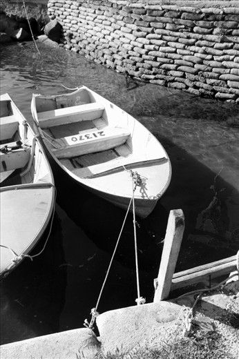 The boats are plain and the wear tells of many a year of hard use but they provide a living for the locals who care little about show.   Many have spent their whole lives with each day rising early to work and will happily work this way until the day they die.