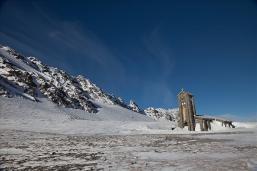 This photograph was taken off the ski path in Val D'isere, France. I went as far as I could on the ski lifts and then had taken the mountain paths to discover this church. I was struck by how, so far from any settlement, there was a church looking out towards the Italian Alps. To me, it felt like the church had been built as close to the heavens as possible.