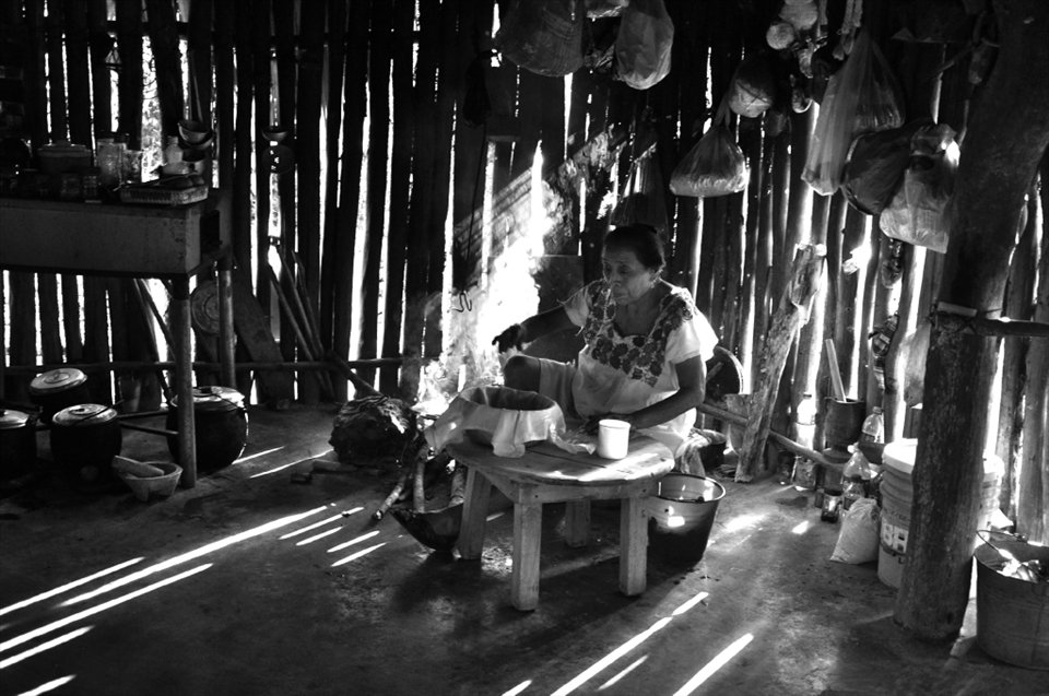 A village of two families, six people. Her son does not attend school but he taught himself to speak Spanish. He read the little prince. She silently smiles and shows me how to make tortillas over the open fire.