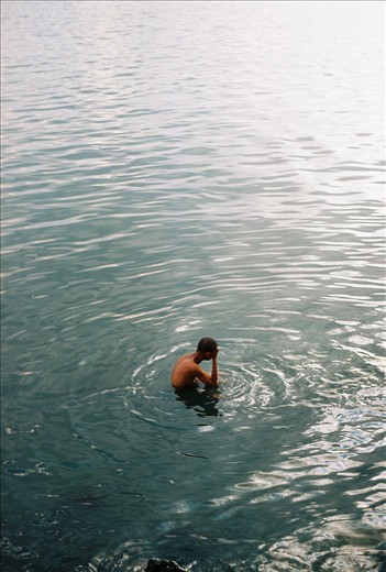An intimate moment of a man having his afternoon shower. 