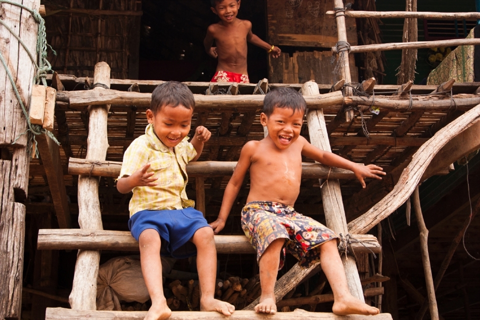 While their older family members are busy with their daily chores, these three boys enjoy their freedom and entertain themselves with a good old fashioned game of ‘It’. Although all the people in the village of Kompong Phhluk live with only the most basic amenities, the overpowering sense when I visited there was how happy they were. The importance of family and team work has not been lost as is so often the case in the Western world.