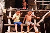 While their older family members are busy with their daily chores, these three boys enjoy their freedom and entertain themselves with a good old fashioned game of ‘It’. Although all the people in the village of Kompong Phhluk live with only the most basic amenities, the overpowering sense when I visited there was how happy they were. The importance of family and team work has not been lost as is so often the case in the Western world.: by katpayne, Views[571]