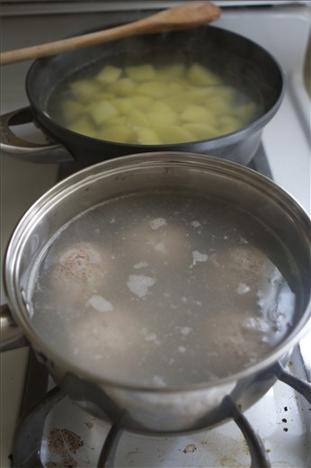 The simmering water should just cover the meatballs in a medium sauce pan