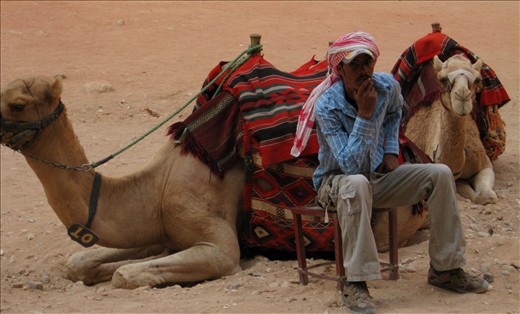 Camel driver deep in thought.