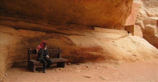 A Jordanian stopping for a smoke in the ancient carved city of Petra.