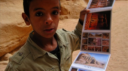 Bedouin boy selling post-cards.