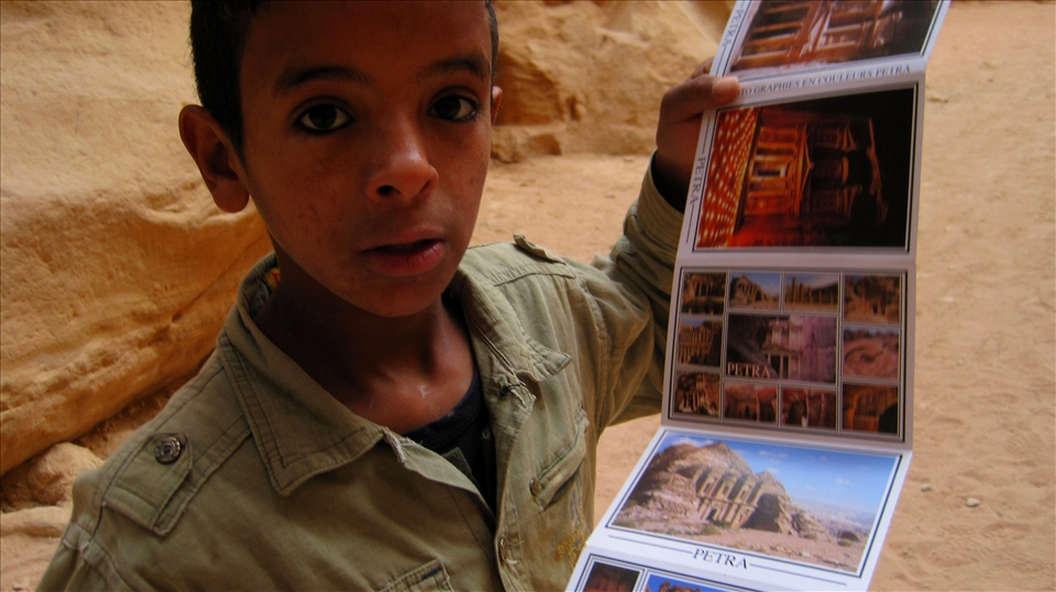 Bedouin boy selling post-cards.