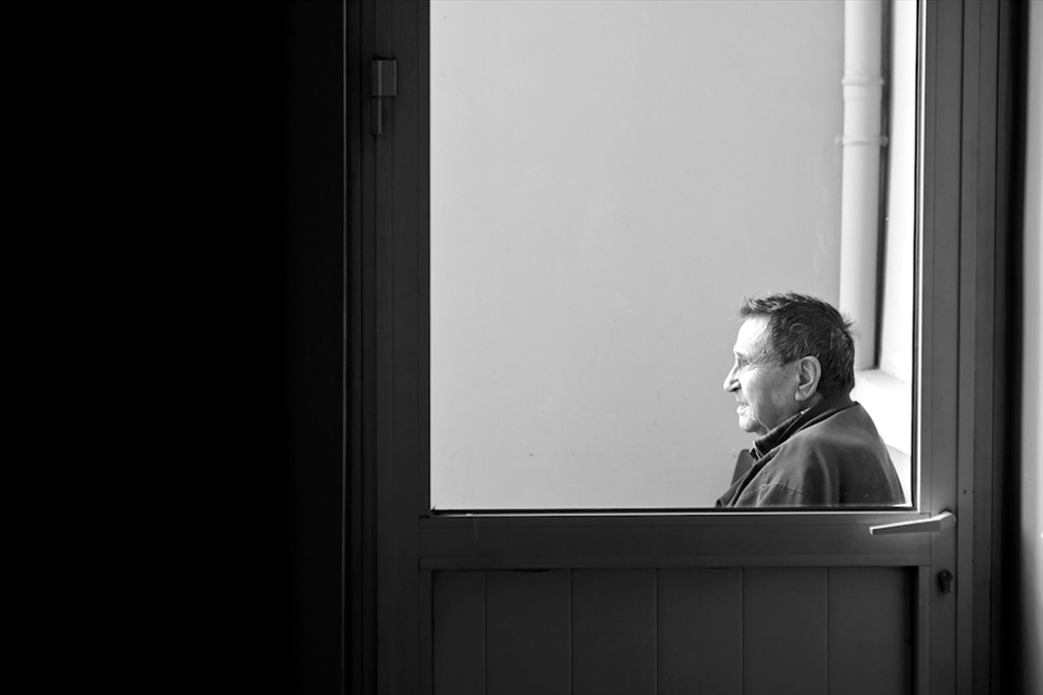 Servet seemed comparatively keen on his life in the Home, and I would find him weekly on this patio, either just sitting or otherwise smoking cigarettes. This particular afternoon he grew nostalgic as he relived to me his days as a North African bus driver for the British Army. The way I understood he would drive the doctors to their destinations, and I watched as his wrinkled and stretched fingers would retrace his route along the deserts of North Africa. Shortly afterwards I retreated from the porch to snap his pensive portrait.