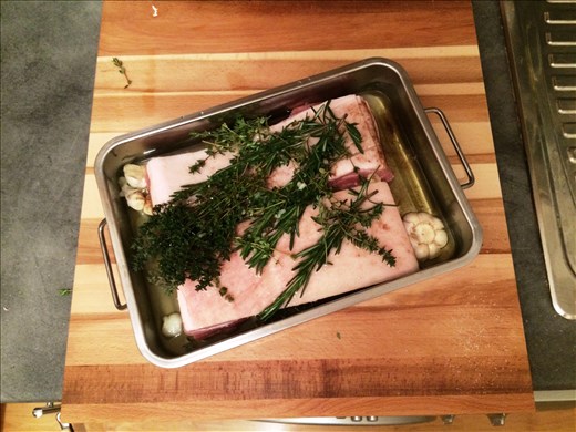 Preparing the pork for the confit.