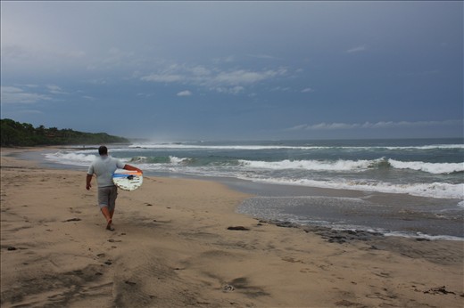 Steve heading to surf at Playa Negra