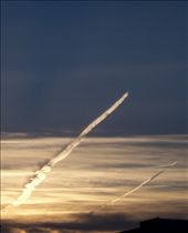 Transit at the final airport. Two jet fighters training had painted the sunset sky with adventure trails. On a personal level, it signifies the beginning of my own adventure and leap of faith. Washington D.C, USA. : by kenyeo, Views[474]