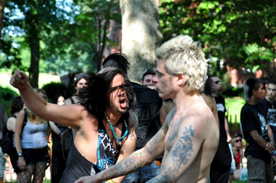 Just like two lions, these men are showing who is the leader of the pack. 