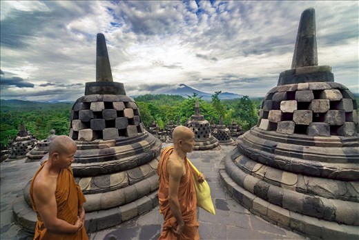Two Buddhist monks complete their morning rituals at Borobudur. I won't pretend 
