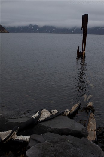  Long forgotten, the remnants of this floating submarine dock will soon be lost to nature. Built by the Russian Navy in 1987, this now abandoned base remained in active service until 1994. Simushir Island, Russian Far East.