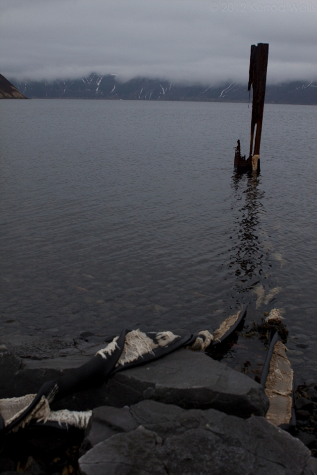  Long forgotten, the remnants of this floating submarine dock will soon be lost to nature. Built by the Russian Navy in 1987, this now abandoned base remained in active service until 1994. Simushir Island, Russian Far East.