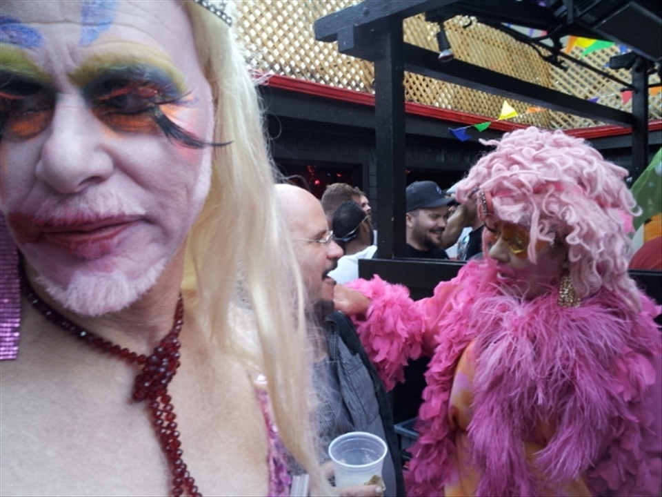 Pretty in Pink: Gender roles are challenged and celebrated. Grandly designed and colorful outfits are in worn proudly and pink is the primary color to express this with. 