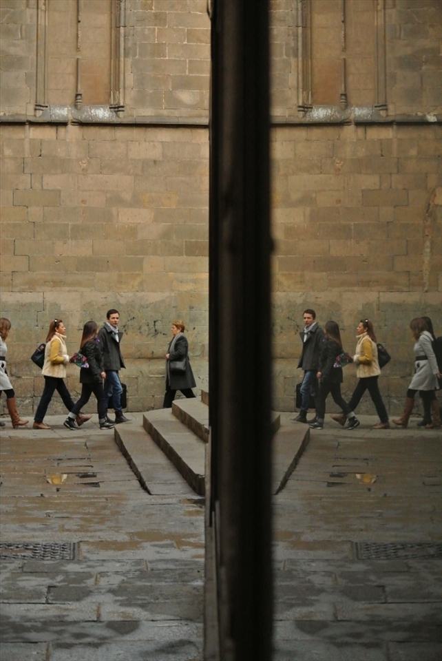 Never Stopping: With so much to see and do, tourists and locals alike rarely stop for a second look while walking through the Old Town’s narrow lanes. Upon seeing this well placed window, I proceeded to adjust the shutter speed and capture numerous pictures of blurred individuals in a hurry. Nonetheless, the pick of the bunch was this simple, mirrored shot that displays the relaxed yet purposeful stroll of these locals.
