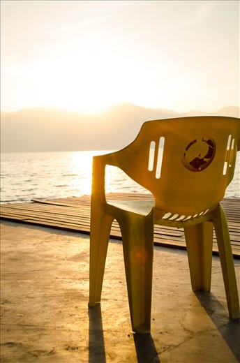 Repeated colours on a deck. A reminder that anything can watch a sunset.