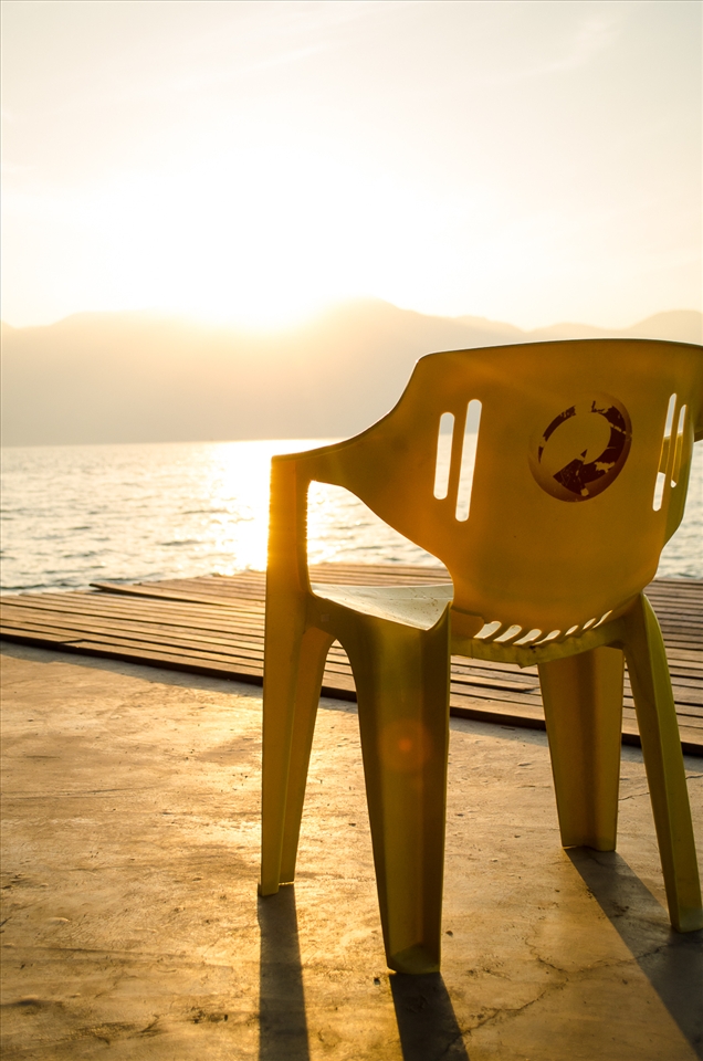 Repeated colours on a deck. A reminder that anything can watch a sunset.